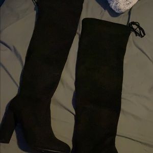 Heeled knee high boots